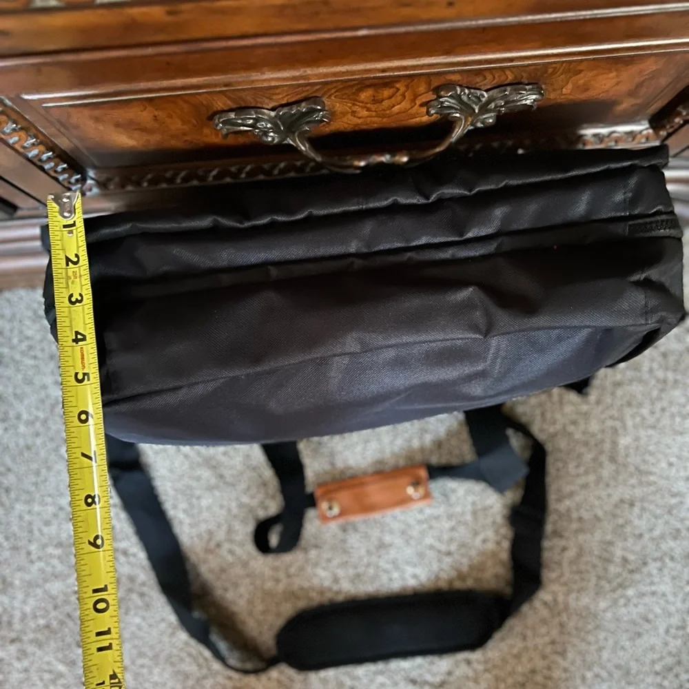 NWT The Journeyman Bag Co Duffle Bag in black with red mesh interior.